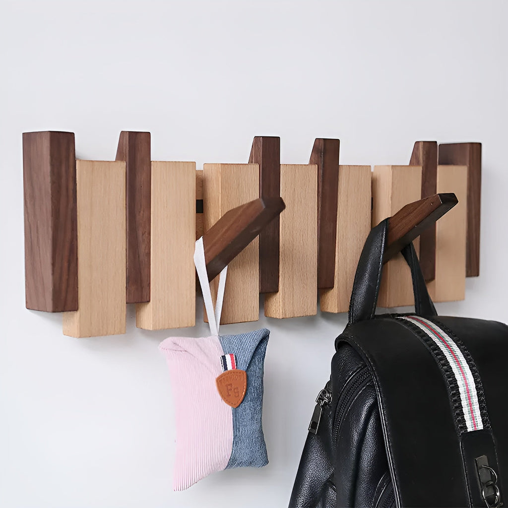 Wooden wall hooks with folding pegs