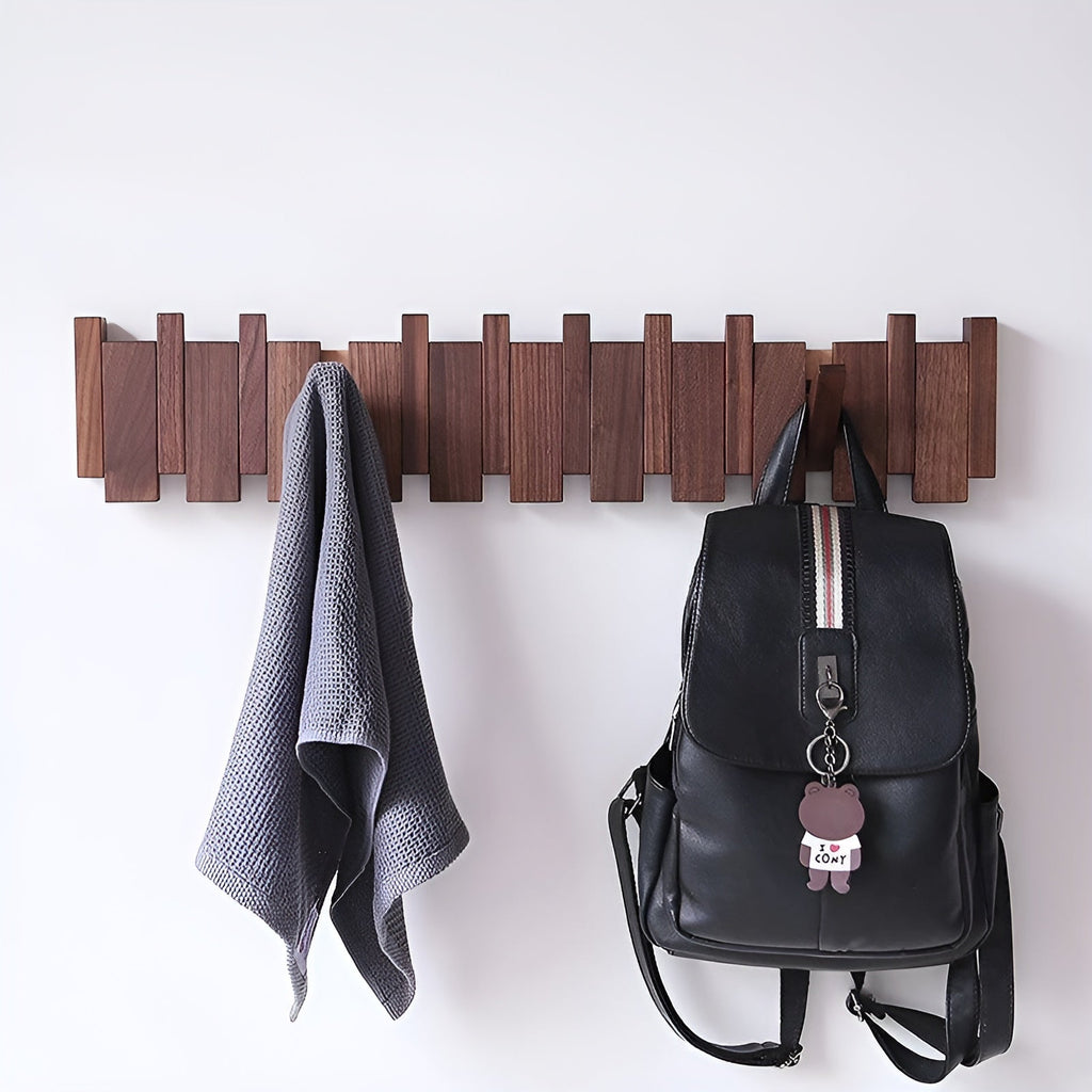 Wooden wall hooks with folding pegs