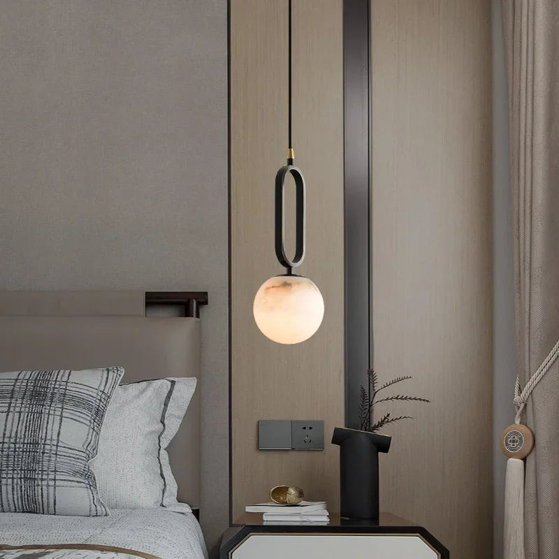 Marble pendant light with copper accents