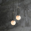 Marble pendant light over dining table