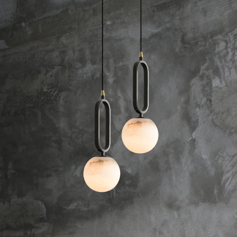 Marble pendant light over dining table