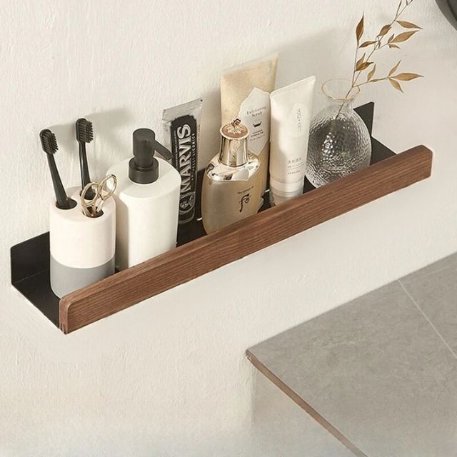 Wood shelf above sink